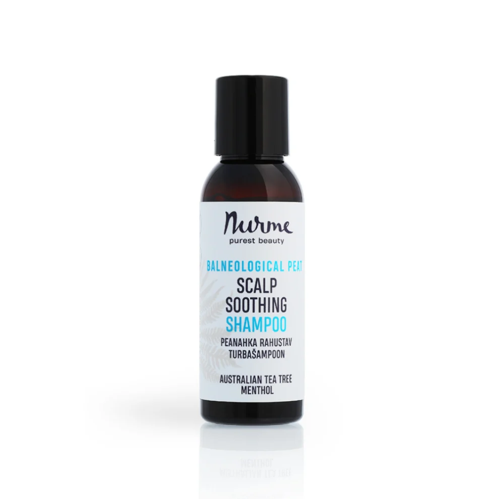 Travel size scalp-soothing peat shampoo with tea tree oil